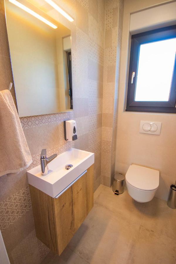 Apartmani Le-Lu Каштела Экстерьер фото